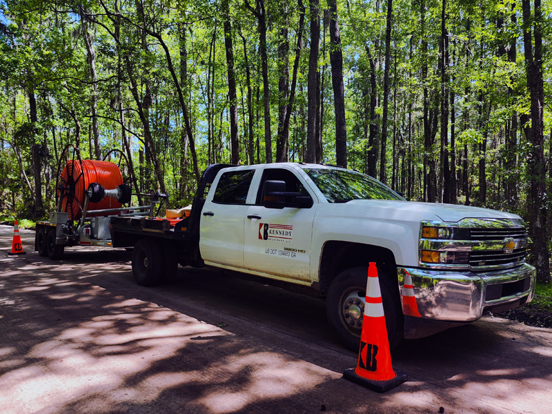 Work truck on location with cable reel