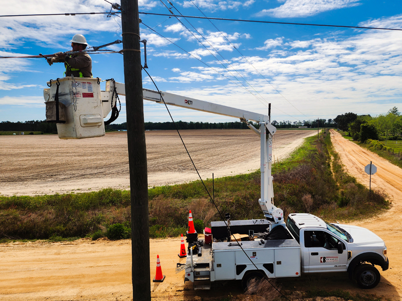 Worker in bucket truck